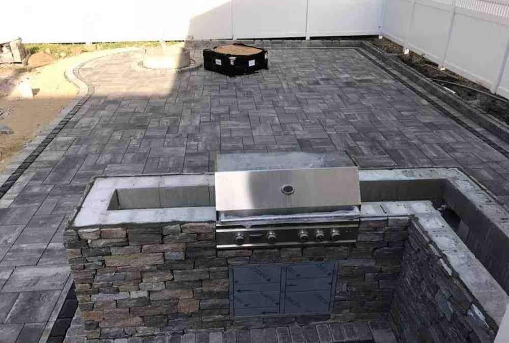 How to Build a Retaining Wall with Concrete Blocks (Without Breaking Your Back)