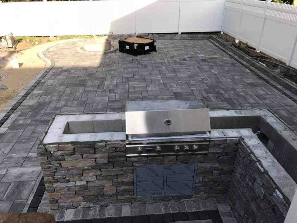 How to Build a Retaining Wall with Concrete Blocks (Without Breaking Your Back)