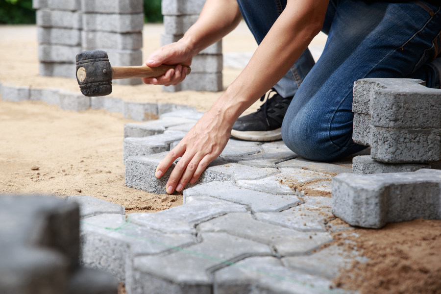 Backyard paver patio design with planting beds MA