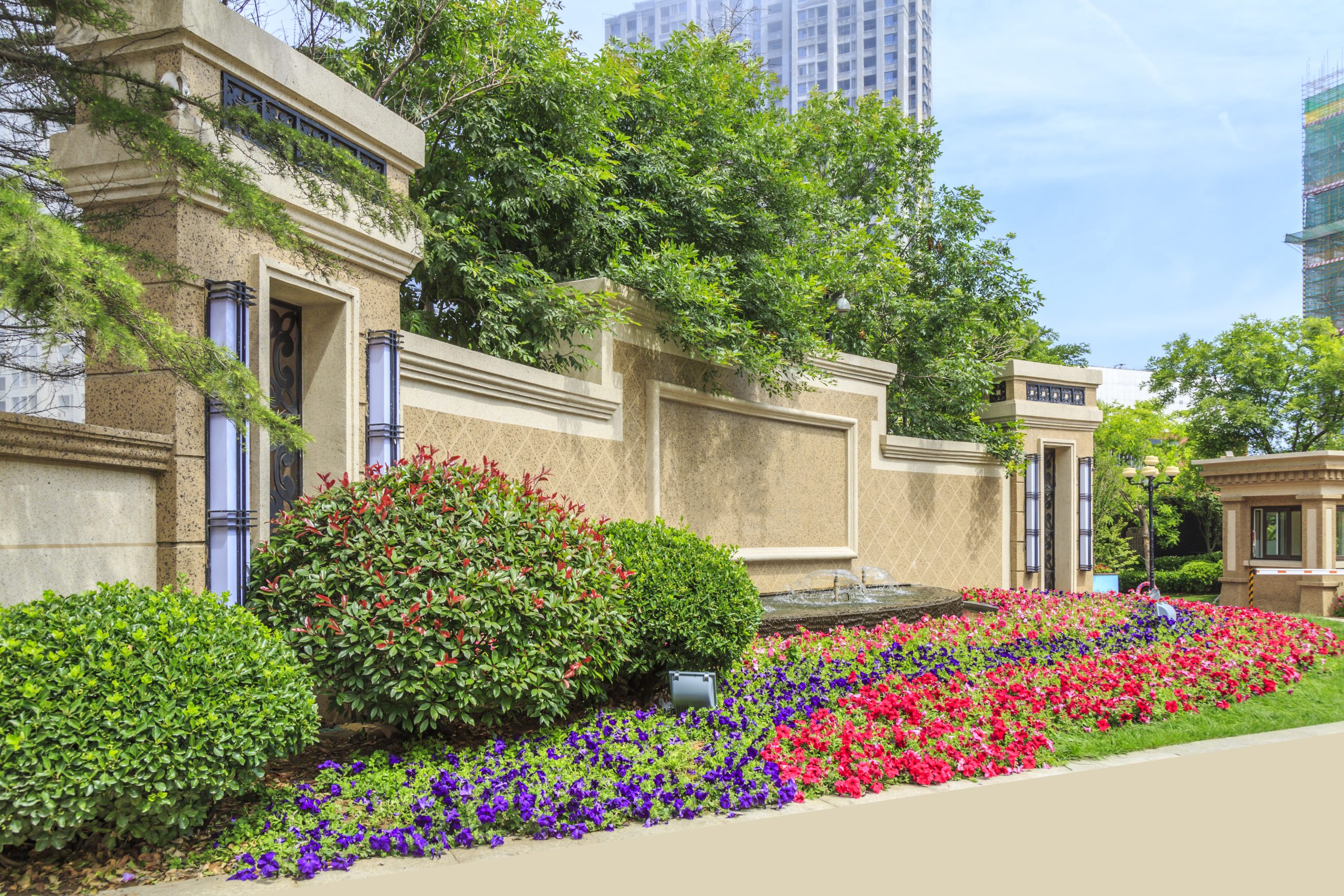 Seasonal flower bed display at a commercial property entrance Massachusetts